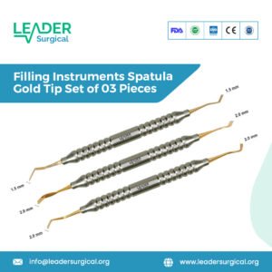 A set of three dental filling spatulas with gold plated tips for mixing and placing composite resin and other materials.